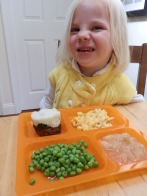 Fiona enjoys a cafeteria-style lunch during our homeschool version of preschool.